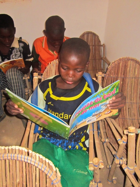 Children reading inside the new Sebba library