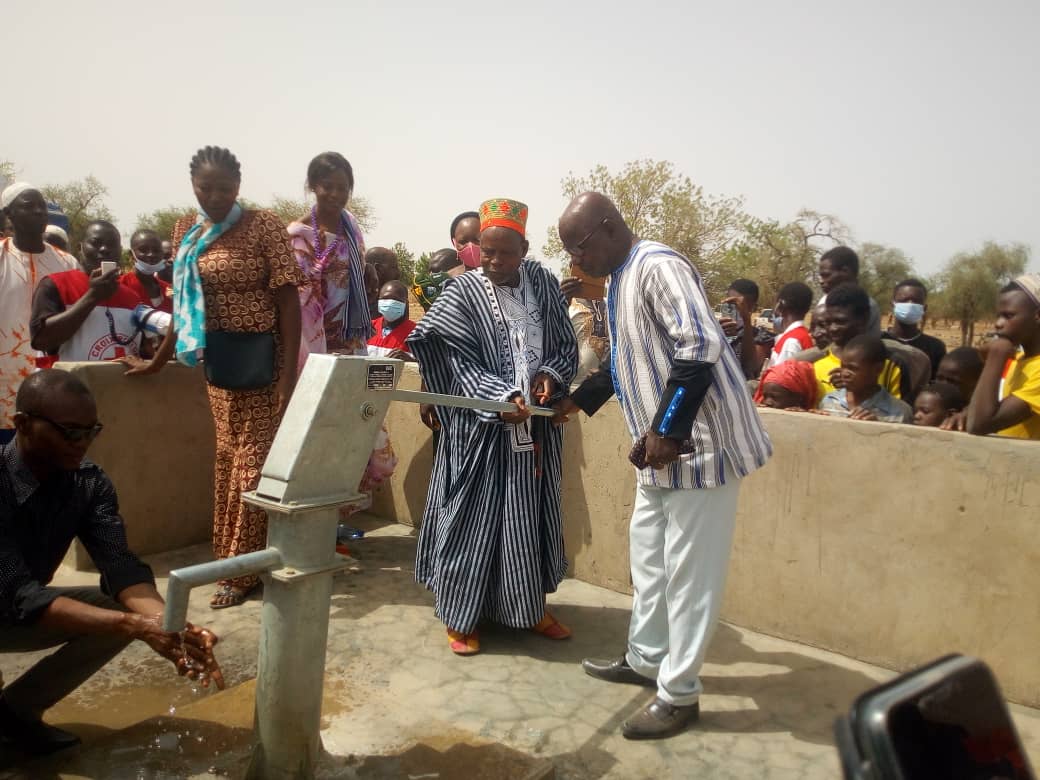 Village chief pumping from new well