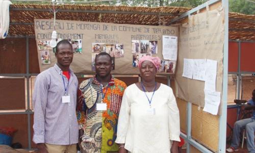 Educating farmers at a local exposition.